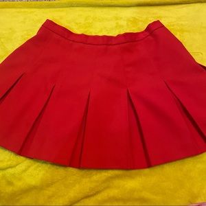 Vintage red pleated cheerleading / tennis skirt marked size 18 fits size 10-12